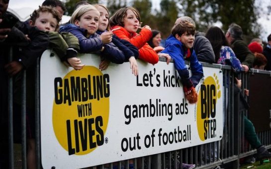 a "let's kick gambling out of football" banner