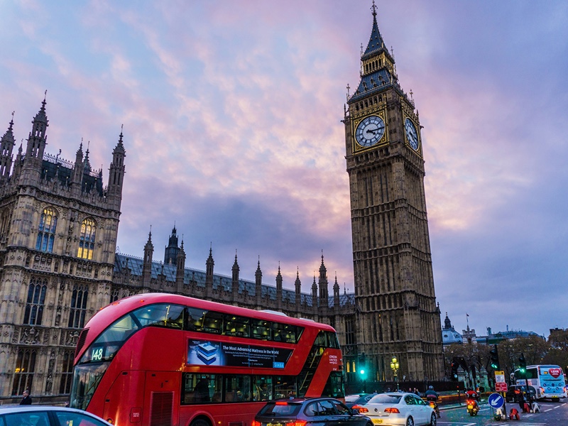 Westminster and Big Ben with a bus in the foreground