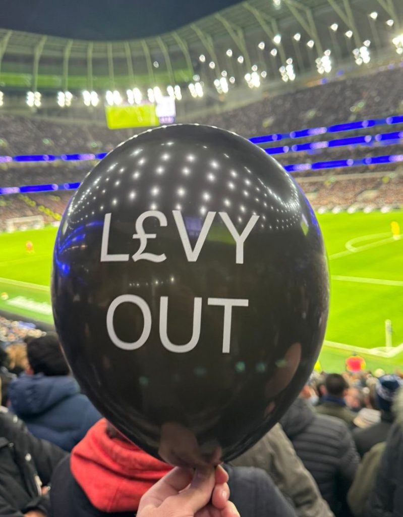 a Change for Tottenham Levy Out balloon inside Tottenham Hotspur Stadium